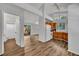 Open kitchen concept with wood cabinets, tile floors, and seamless access to living spaces at 1310 Oregon St, Orlando, FL 32803