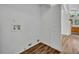 Laundry room with wood flooring and closet at 1310 Oregon St, Orlando, FL 32803