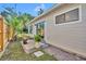 Relaxing outdoor area with a sliding glass door and a view of the beautifully landscaped yard at 1310 Oregon St, Orlando, FL 32803