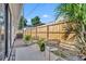 Charming brick patio with stylish seating and a privacy fence, perfect for outdoor relaxation at 1310 Oregon St, Orlando, FL 32803