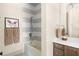 Stylish bathroom with a tub and shower combination, featuring unique tile and a modern vanity at 1341 Place Picardy, Winter Park, FL 32789