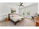 Inviting bedroom offers a bed, desk, lamps, shutters, and natural lighting at 1341 Place Picardy, Winter Park, FL 32789