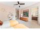 Bright bedroom featuring colorful decor, playful wallpaper, and connected bathroom at 1341 Place Picardy, Winter Park, FL 32789