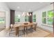 Elegant dining room with a modern table, stylish chairs, and ample natural light at 1341 Place Picardy, Winter Park, FL 32789
