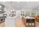 Spacious kitchen with double islands, stainless steel appliances, and custom cabinetry at 1341 Place Picardy, Winter Park, FL 32789