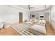Open living space features a comfortable couch, area rug, modern fan and ample natural light at 1341 Place Picardy, Winter Park, FL 32789