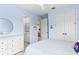 Comfortable bedroom with a ceiling fan and an ensuite bathroom and walk-in closet at 1394 Grove Ter, Winter Park, FL 32789