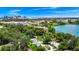 Beautiful aerial view of the home and neighborhood situated along the edge of a scenic lake at 1420 Rock Lake Dr, Orlando, FL 32805