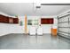 Garage featuring a washer, a dryer, a sink, and cabinets at 1420 Rock Lake Dr, Orlando, FL 32805