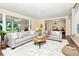 Spacious living room with comfortable seating and an open layout to the dining area at 1420 Rock Lake Dr, Orlando, FL 32805
