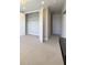 Comfortable bedroom featuring neutral carpeting and a large closet at 16210 Ravenna Ct, Montverde, FL 34756