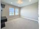 Neutral bedroom features recessed lights, carpet, built-in cabinet and windows at 16210 Ravenna Ct, Montverde, FL 34756