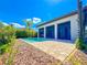 Backyard pool with lush landscaping and a covered patio with outdoor kitchen at 16210 Ravenna Ct, Montverde, FL 34756