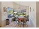Breakfast nook featuring a small table with chairs and sliding glass doors to the backyard pool at 1956 Southern Dunes Blvd, Haines City, FL 33844