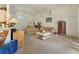 Bright living room with neutral paint, vaulted ceilings, and a large window for natural light at 1956 Southern Dunes Blvd, Haines City, FL 33844