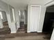 Hallway view leading to bathroom and closet at 2107 Hollywood Ave, Eustis, FL 32726