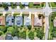 Aerial view showcasing homes with pools and well-manicured landscaping in a vibrant community at 25105 Laurel Valley Rd, Leesburg, FL 34748
