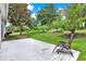 Backyard with a patio and green landscaping at 25105 Laurel Valley Rd, Leesburg, FL 34748