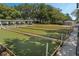 Enjoy a friendly game on the community's well-maintained bocce ball court, surrounded by lush landscaping and shaded areas at 25105 Laurel Valley Rd, Leesburg, FL 34748