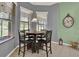 Charming breakfast nook with large windows and a view to the yard at 25105 Laurel Valley Rd, Leesburg, FL 34748