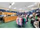 Well-stocked pro shop showcasing golf apparel and accessories with organized displays at 25105 Laurel Valley Rd, Leesburg, FL 34748