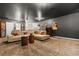 Finished basement with projector, comfortable sectional sofa, and theater lighting at 3363 Morelyn Crest Cir, Orlando, FL 32828