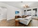 Spacious living room with wood floors, a comfy gray sofa, and lots of natural light at 3363 Morelyn Crest Cir, Orlando, FL 32828