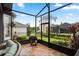Screened patio offers views of the lush backyard and surrounding neighborhood at 3363 Morelyn Crest Cir, Orlando, FL 32828