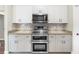 Well-equipped kitchen featuring stainless steel appliances and ample cabinet space at 3618 Pompano Ct, Gotha, FL 34734