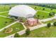Aerial shot of the Apopka Amphitheater, showcasing its unique architecture, surrounding green spaces, and well-maintained walkways at 3994 Knott Dr, Apopka, FL 32712