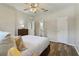 Bedroom has wood floors and an ensuite bathroom at 3994 Knott Dr, Apopka, FL 32712