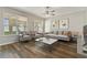 Inviting living room with plenty of natural light and modern decor at 3994 Knott Dr, Apopka, FL 32712