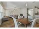 Open-concept living and dining areas with modern furnishings and stylish decor at 3994 Knott Dr, Apopka, FL 32712