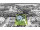 Aerial shot of home with outlined property lines showcasing the spacious lot and surrounding neighborhood at 413 Harbour Oaks Pointe Dr, Edgewood, FL 32809