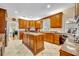 Bright kitchen with stylish countertops, stainless steel appliances, and ample cabinet space at 413 Harbour Oaks Pointe Dr, Edgewood, FL 32809