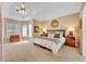 Inviting bedroom featuring large windows, neutral tones, and a comfortable king bed at 413 Harbour Oaks Pointe Dr, Edgewood, FL 32809