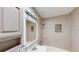 Bathroom with a single sink vanity, and shower with mosaic tile accents at 435 Andes Ave, Orlando, FL 32807
