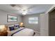 Cozy bedroom featuring a ceiling fan and neutral decor, creating a relaxing atmosphere at 435 Andes Ave, Orlando, FL 32807