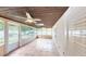 Sunroom with multiple ceiling fans and lots of windows at 435 Andes Ave, Orlando, FL 32807