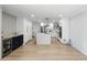 Bright kitchen featuring an island, stainless steel appliances, and white cabinetry at 4611 Cranston Pl, Orlando, FL 32812