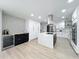 Bright modern kitchen with stainless appliances, a spacious island, and plenty of counterspace at 4611 Cranston Pl, Orlando, FL 32812