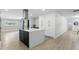 Kitchen featuring an island with white counters and black cabinets at 4611 Cranston Pl, Orlando, FL 32812