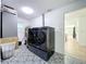 Modern laundry room with side-by-side washer and dryer on a decorative tile floor at 4611 Cranston Pl, Orlando, FL 32812