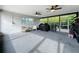 Spacious covered patio with ceiling fans and plenty of room for entertaining at 4611 Cranston Pl, Orlando, FL 32812