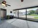 Enclosed patio with clear views of the home's exterior and backyard at 4611 Cranston Pl, Orlando, FL 32812