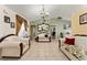 Bright living room featuring tile floors, vaulted ceilings, and neutral color scheme at 470 Cardinal Ct, Kissimmee, FL 34759