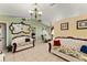 Open living area with tile flooring, elegant decor, and views into the dining space at 470 Cardinal Ct, Kissimmee, FL 34759