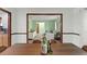 Open-concept living room features stylish decor, abundant natural light, and seamless flow at 473 Burnt Tree Ln, Apopka, FL 32712