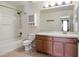 The bathroom has a tub and shower combination, a vanity, and a toilet at 512 Bella Rosa Cir, Sanford, FL 32771