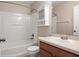 The bathroom has a tub and shower combination, a vanity, and a toilet at 512 Bella Rosa Cir, Sanford, FL 32771